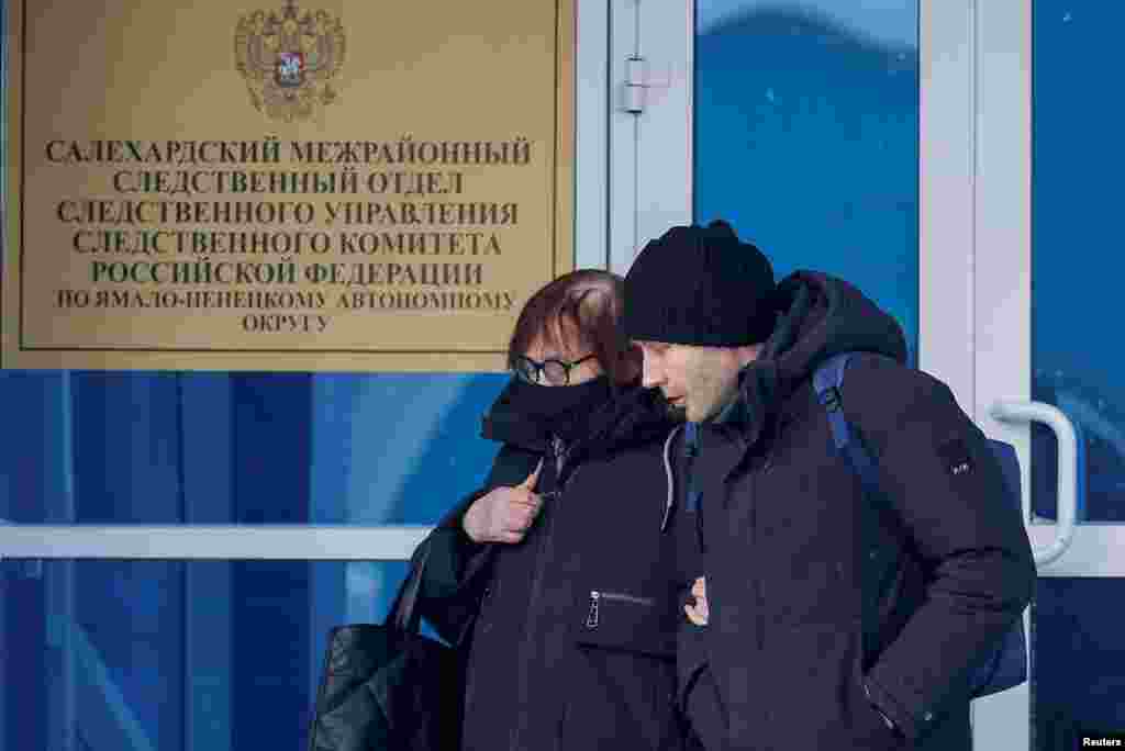 Lyudmila Navalnaya, the mother of late Russian opposition leader Alexei Navalny, and his lawyer Alexei Tsvetkov walk out of an office of the Investigative Committee&#39;s regional department in the city of Salekhard in the Yamal-Nenets Region.