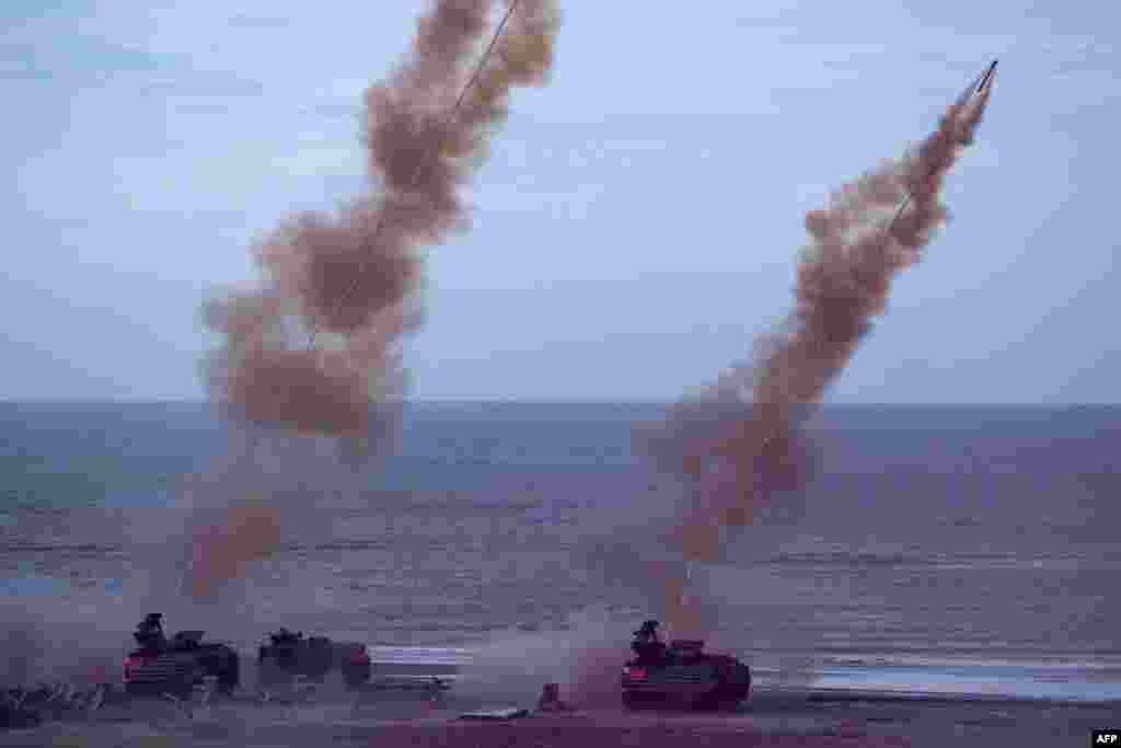 Taiwan military soldiers fire the ML154 Mine Clearance Launcher during the annual Han Guang anti-landing drill at Bali beach, New Taipei City.