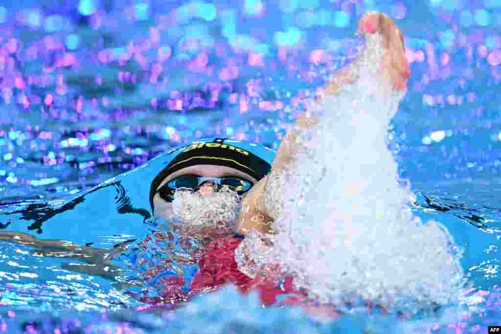Netherlands&#39; Maaike De Waard competes in a heat of the women&#39;s 100m backstroke swimming event during the 2024 World Aquatics Championships at Aspire Dome in Doha, Qatar.