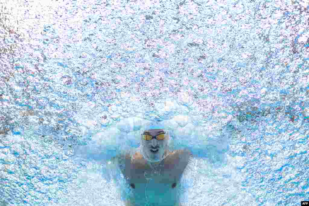 France&#39;s Maxime Grousset competes in a semi-final heat of the men&#39;s 50m butterfly swimming event during the World Aquatics Championships in Fukuoka, Japan.