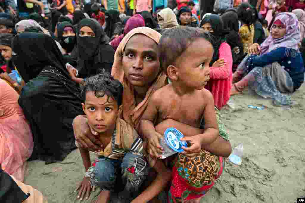 Newly-arrived Rohingya refugees wait to be transferred to a shelter in Batee beach, Aceh province.&nbsp;At least 147 Rohingya refugees, mostly women and children, landed in Indonesia&#39;s westernmost province.