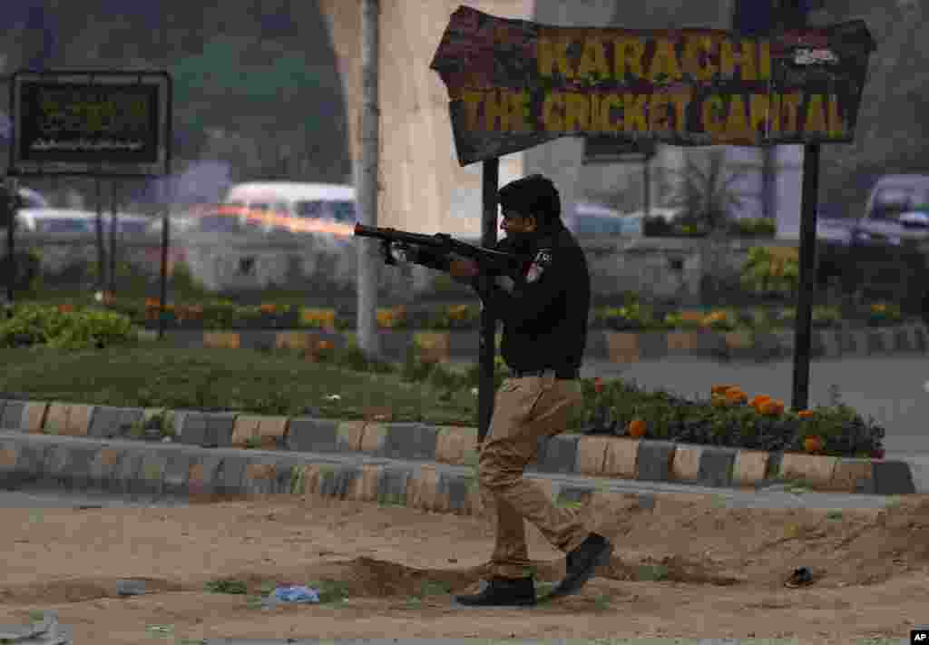 Pakistani police fired tear gas to disperse supporters of former prime minister Imran Khan and political party Pakistan Tehreek-e-Insaf (PTI) during an election campaign rally in Karachi.