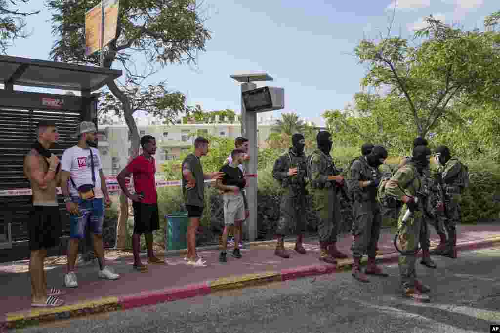 Israeli security forces are seen deployed at the site of a shooting attack in the West Bank Israeli settlement of Maale Adumim.&nbsp;A Palestinian gunman opened fire in an Israeli settlement east of Jerusalem, wounding at least four people, Israeli medics said.&nbsp;