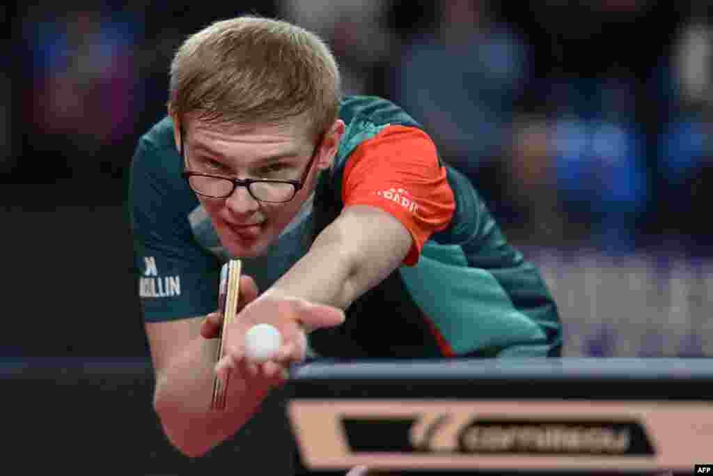 French Felix Lebrun serves to French Simon Gauzy during the men&#39;s single semi-final table tennis match in the France 2024 Championship at FDI Stadium in Montpellier, southtern France.