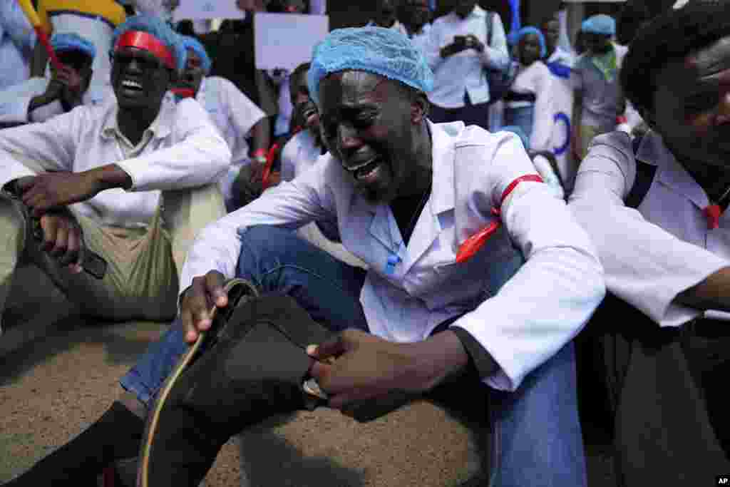 Doctors and other medical staff take part in a protest in downtown Nairobi, Kenya.&nbsp;Hundreds of doctors have protested in the streets demanding better pay and working conditions in an ongoing nationwide strike for about a month.