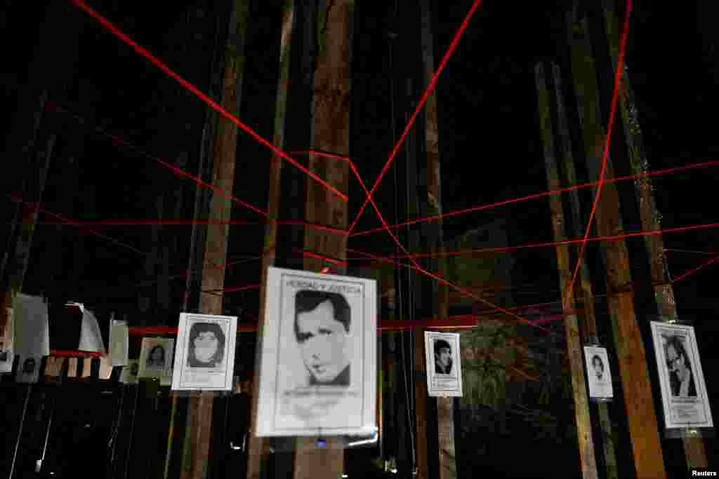 Signs featuring detained and missing people and reading &#39;Truth and Justice&#39; are placed at Jose Domingo Canas Memorial House, a former detention, torture and forced disappearance quarters of the secret police of the Augusto Pinochet dictatorship, in Santiago, Chile, Aug. 16, 2023.