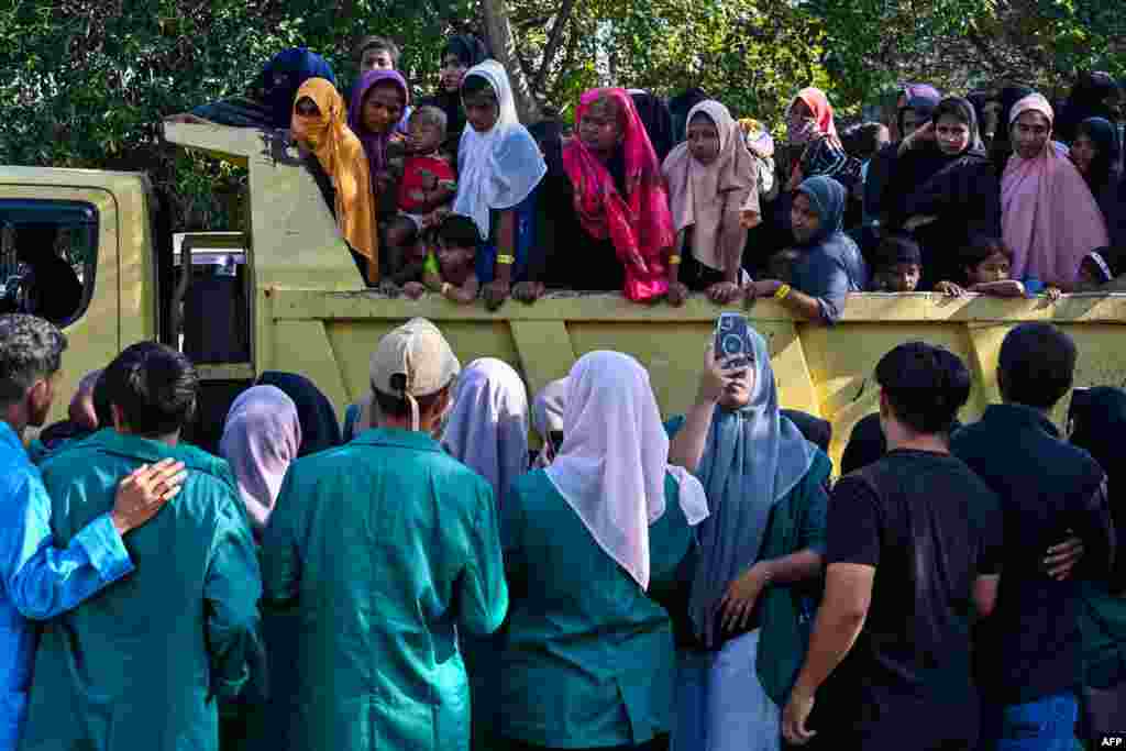 Rohingya refugees crowd into a vehicle for relocation to a nearby government building after demonstrating university students forced them out of the current government facility, in Banda Aceh.&nbsp;Hundreds of university students in Indonesia&#39;s westernmost province stormed a temporary shelter for more than a hundred Rohingya refugees on December 27, forcing them to leave in the latest rejection of the persecuted Myanmar minority.&nbsp;