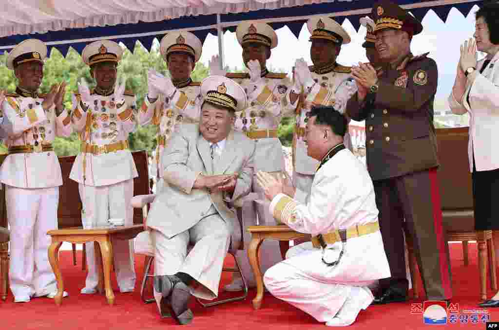 North Korean leader Kim Jong Un, center, attends the unveiling ceremony of the new submarine No. 841, named the Hero Kim Kun Ok, at an undisclosed location in North Korea, in this picture taken Sept. 6, 2023, and released by North Korea&#39;s official Korean Central News Agency on September 8. North Korea on September 8 announced it had built a &quot;tactical nuclear attack submarine&quot; as part of its effort to strengthen its naval force, the state news agency KCNA reported.&nbsp;