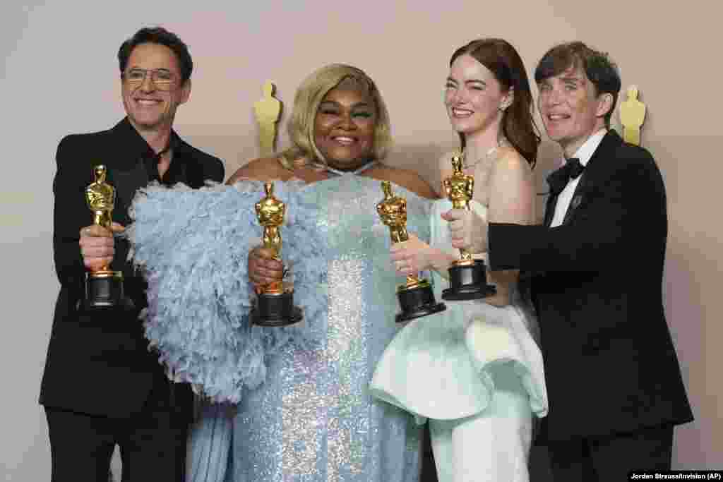 from left:&nbsp;Robert Downey Jr., winner of the best supporting actor for &quot;Oppenheimer,&quot; Da&#39;Vine Joy Randolph, winner of the best supporting actress for &quot;The Holdovers,&quot; Emma Stone, winner of the best actress for &quot;Poor Things,&quot; and Cillian Murphy, winner of the best actor for &quot;Oppenheimer,&quot; pose in the press room at the Oscars, March 10, 2024, at the Dolby Theatre in Los Angeles.