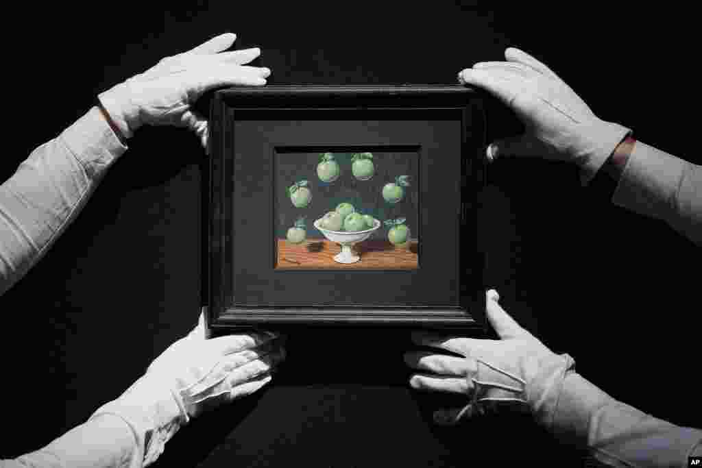 A painting by Rene Magritte called Le principe d&#39;Archimede is displayed at Christie&#39;s auction rooms in London.&nbsp;The painting estimated at 450,000-650,000 UK Pounds (570,000-820,000 US Dollars) will be for auction in the The 20th / 21st Century: London Evening Sale and The Art of the Surreal Evening Sale on March 7.