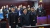 တရုတ်နိုင်ငံဘောလုံးအဖွဲ့ချုပ်ဥက္ကဋ္ဌဟောင်း Chen Xuyuan ကိုတရားရုံးမှာတွေ့ရစဉ် (မတ် ၂၆၊ ၂၀၂၄)