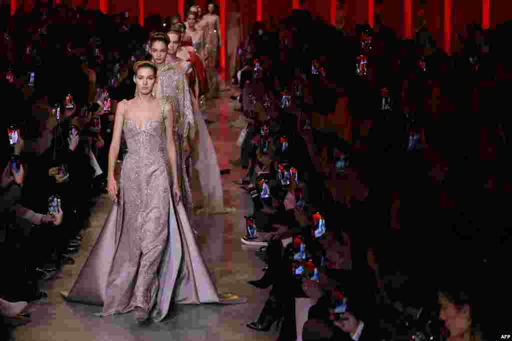 Models present creations by Elie Saab during the Women&#39;s Haute-Couture Spring/Summer 2024 Fashion Week in Paris, France.