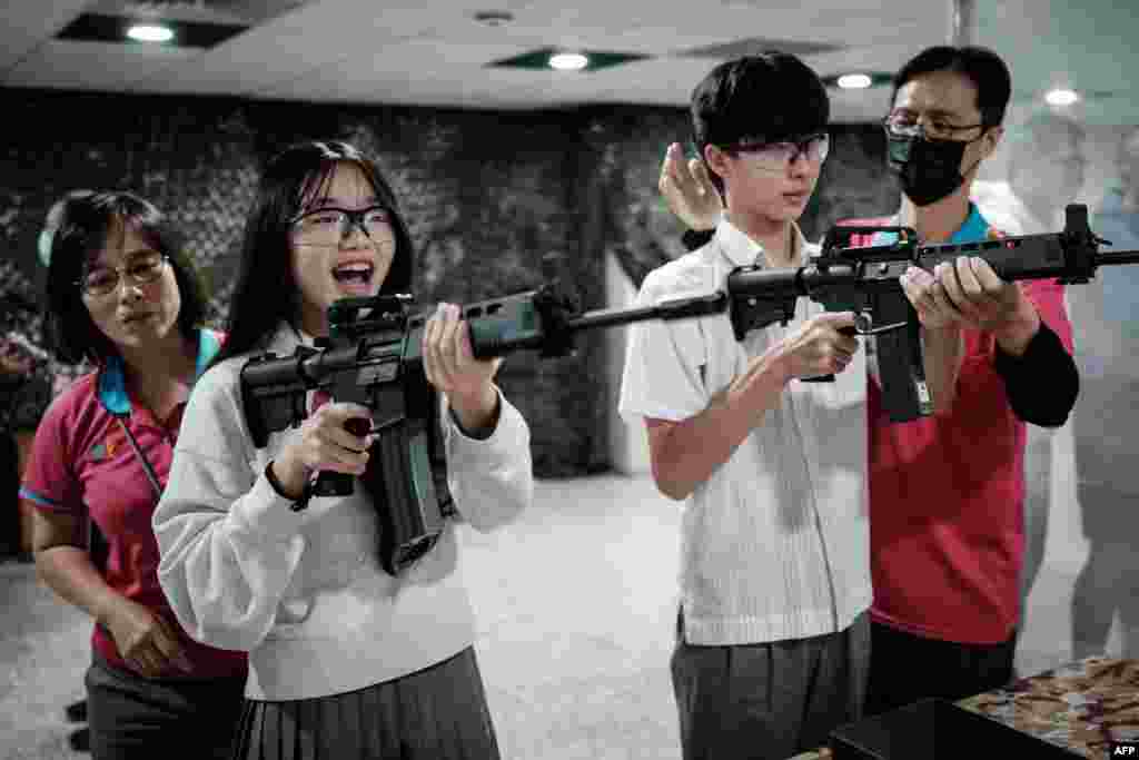 Students learn how to use an airsoft gun from Taiwanese military instructors at Kaohsiung Municipal Sanmin Senior High School in Kaohsiung, Taiwan.&nbsp;Kaohsiung City launched a national defense education program using digital technology for all its high school students.&nbsp;