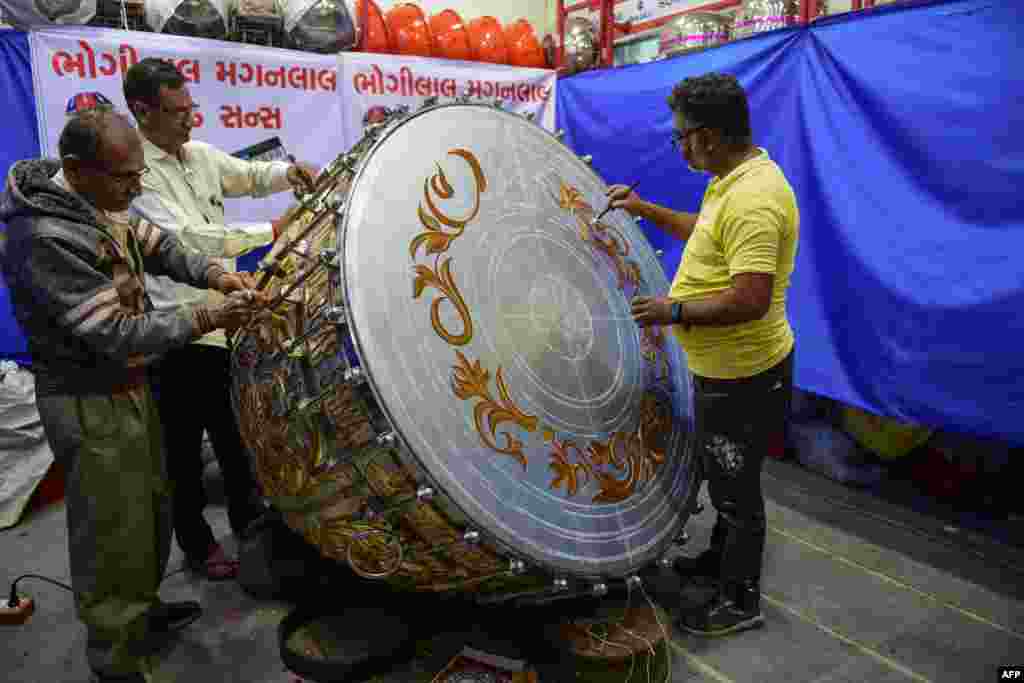 Artisans from Dabgar community works on a huge &#39;Nagara&#39; (Drum) for a temple to Hindu deity Ram in Ayodhya, in Ahmedabad, India.