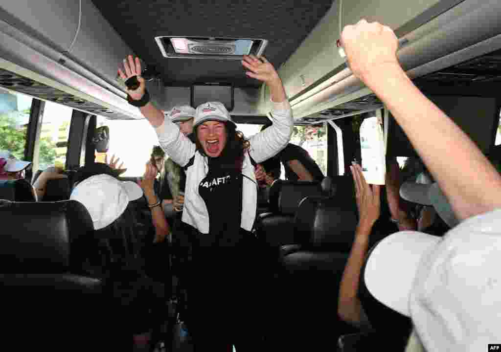 SAG-AFTRA President Fran Drescher, center, boards a bus with guild members traveling to picket lines in Los Angeles, California.&nbsp;Tens of thousands of Hollywood actors went on strike, effectively bringing the giant movie and television business to a halt as they joined writers in the first industry-wide walkout in 63 years.&nbsp;