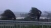Trees are buffeted by strong winds as Hurricane Isaias hits the Bahamas on July 31, 2020 in this still image taken from social media video, filmed from the Grand Isle Resort and Spa at Emerald Bay, Great Exuma.