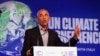 Former US President Barack Obama gestures as he speaks during the COP26 U.N. Climate Summit in Glasgow, Scotland, Nov. 8, 2021,