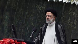 President Ebrahim Raisi delivers a speech after taking his oath as president in a ceremony at the parliament in Tehran, Iran, Thursday, Aug. 5, 2021. The inauguration of Raisi, a protégé of Iran's supreme leader, completes hard-liners' dominance of…