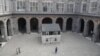 The house of U.S. civil rights campaigner Rosa Parks, rebuilt by artist Ryan Mendoza, is on display in the courtyard of an 18th century Royal Palace, in Naples, Italy, Tuesday, Sept. 15, 2020. (AP Photo/Gregorio Borgia)