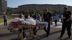 An ethnic Armenian soldier, who was wounded in fighting with Azeri forces over the breakaway region of Nagorno-Karabakh, is carried on a stretcher to Erebouni Medical Center in Yerevan, Armenia, Sept. 29, 2020. (Credit: Hakob Margaryan/Photolure)
