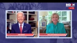 Joe Biden buzëqesh ndërsa merr mbështetjen e ish-Sekretares së Shtetit Hillary Clinton