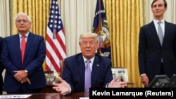 USA, Washington, Flanked by U.S. Ambassador to Israel Melech Friedman and White House senior adviser Jared Kushner, U.S. President Donald Trump announces that Israel and the United Arab Emirates reached a peace deal