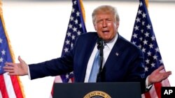 President Donald Trump speaks to a crowd of supporters at the Yuma International Airport Tuesday, Aug. 18, 2020, in Yuma, Ariz. (AP Photo/Matt York)