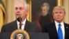 Rex Tillerson habla después de haber asumido el cargo de Secretario de Estado de EE.UU., mientras es escuchado por el presidente Donald Trump.