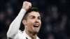 Juventus' Portuguese forward Cristiano Ronaldo celebrates after scoring 2-0 during the UEFA Champions League round of 16 second-leg football match Juventus vs Atletico Madrid on March 12, 2019 at the Juventus stadium in Turin. (Photo by Marco BERTORELLO /