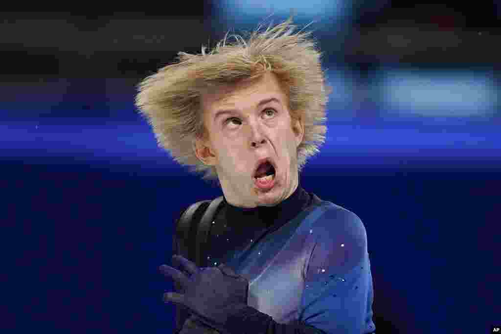 Daniel Grassl of Italy competes in the men&#39;s free skate program during the figure skating event at the 2022 Winter Olympics, in Beijing.