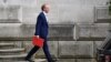 FILE - Britain's Foreign Secretary Dominic Raab leaves the Foreign and Commonwealth Office in central London, July 1, 2020. 