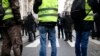 "¡Macron, vamos a derribar tu lugar!", se leía en una pancarta en la capital francesa.