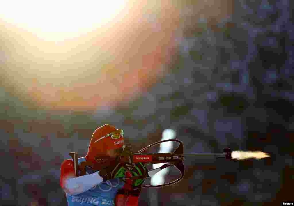 An athlete shoots during training for men&#39;s biathlon 4x7.5km relay at the National Biathlon Center in Zhangjiakou, China, at the 2022 Beijing Olympics.