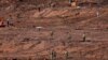El personal militar israelí busca víctimas de desplome de una presa de la compañía minera brasileña Vale SA, en Brumadinho, Brasil, el 30 de enero.