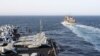 El portaaviones de clase Nimitz USS Abraham Lincoln (CVN 72) navega junto al buque de apoyo de combate rápido USNS Arctic (T-AOE 8) para una reposición, en el Mar Arábigo. Junio 7 de 2019. Foto: U.S. Navy